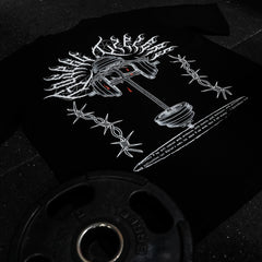 Black t-shirt with white graphic design on a dark background